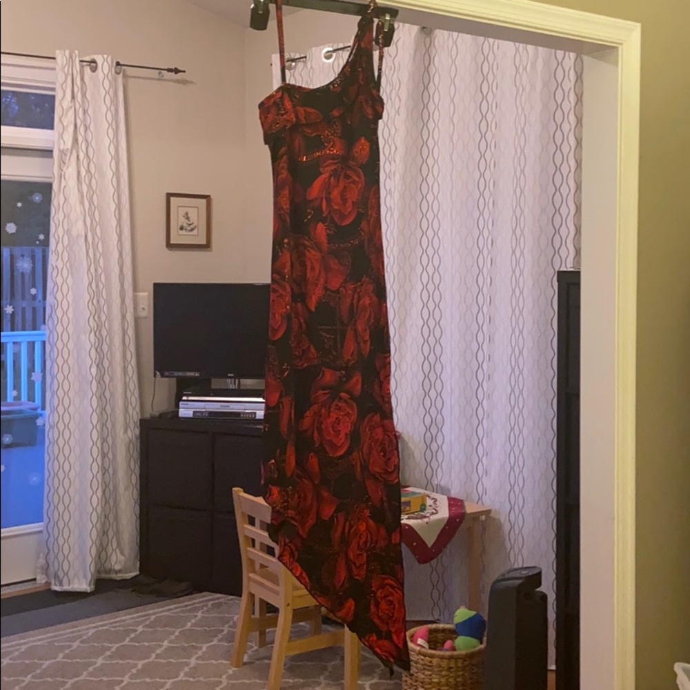 Red and black prom dress with a slit